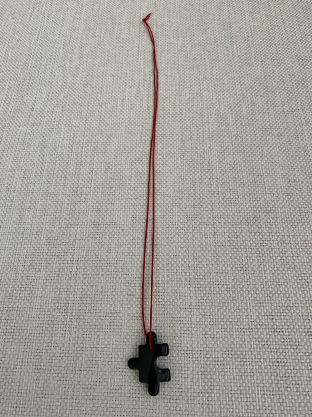Black Acrylic Puzzle Piece Charm Pendant Necklace with Red Cord